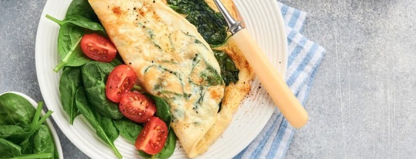 Omelette spinach, onions and tomato