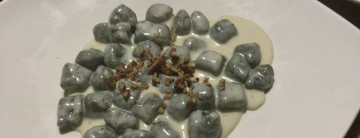 Spinach gnocchi with gorgonzola cheese and nuts