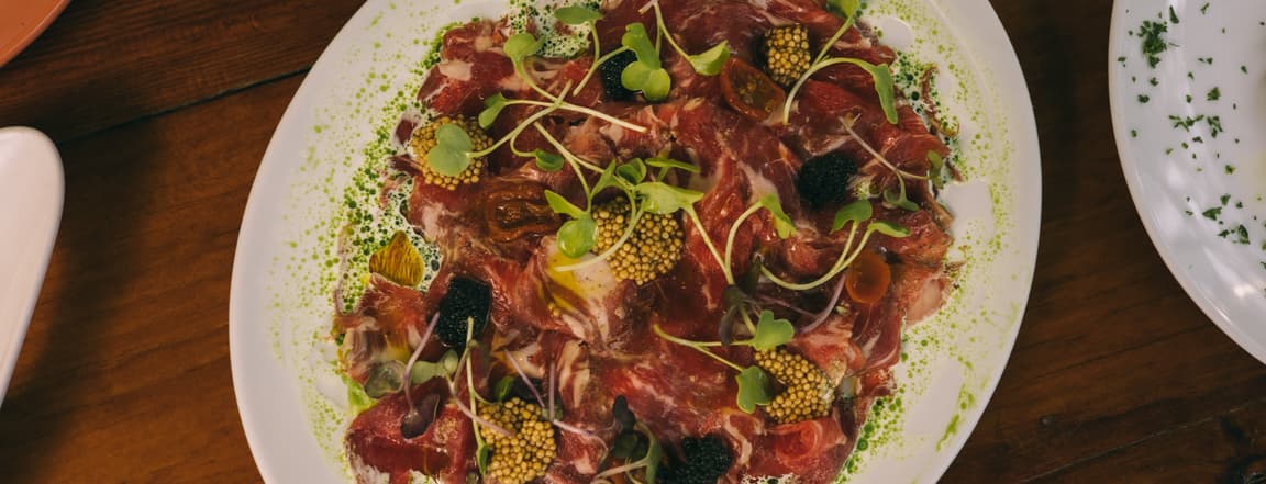 Angus carpaccio, burrata water and herring caviar