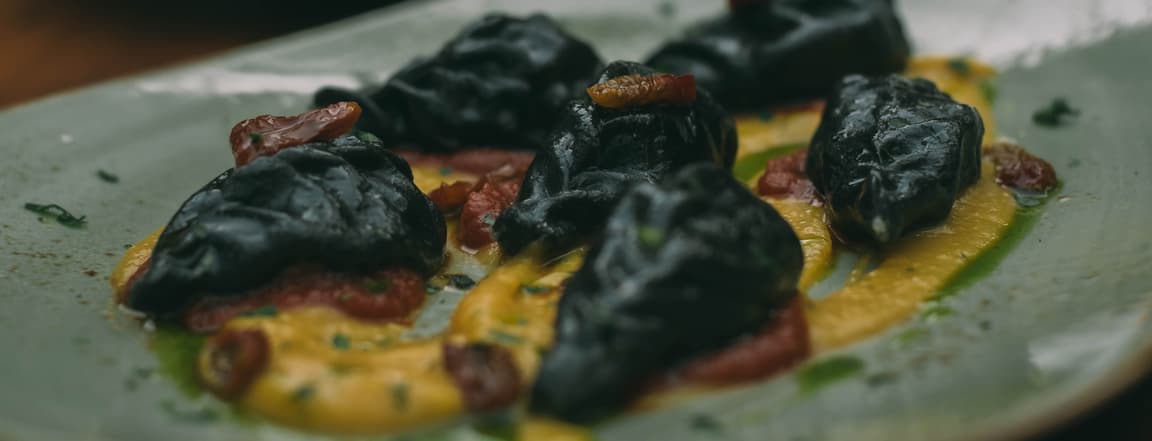 Seafood culurgiones with butternut squash cream