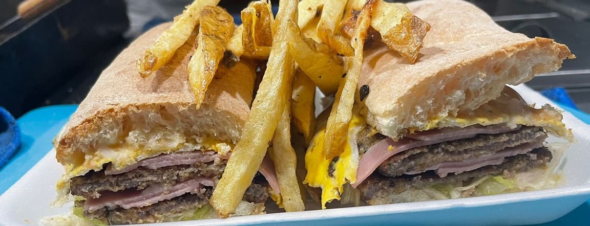 Double beef or chicken milanesa sandwich with french fries