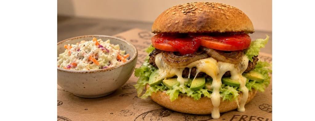 Classic burger with coleslaw salad