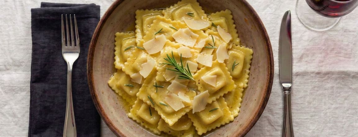 Ricotta and spinach ravioli in butter and rosemary sauce