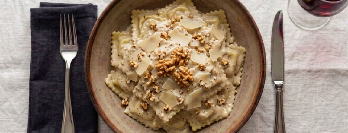 Ricotta and spinach ravioli in walnut cream sauce