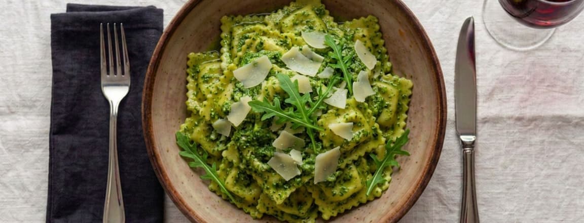 Ricotta and spinach ravioli with arugula pesto sauce