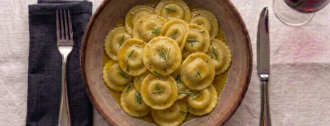 Salmon and ricotta ravioli in butter and rosemary sauce