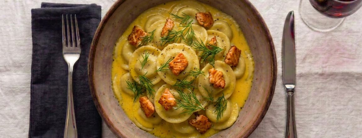 Salmon and ricotta ravioli with orange sauce