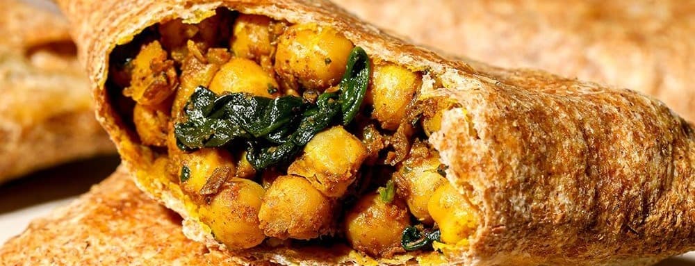 Two samosas -channa (chick peas) masala