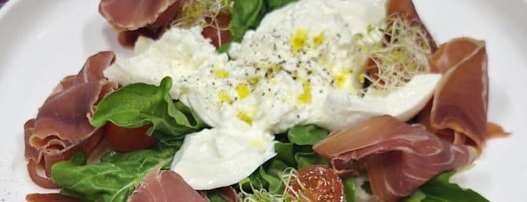 Burrata with serrano ham and rocket salad